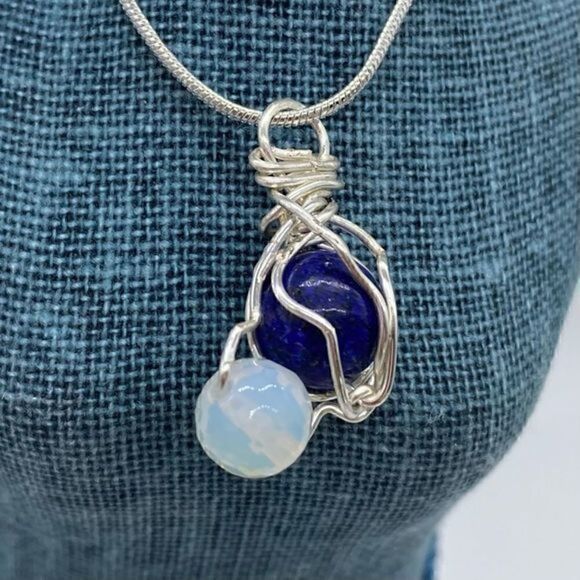Brand new. Lapis lazuli and moonstone wrapped with silver plated wire pendant - Picture 1 of 5